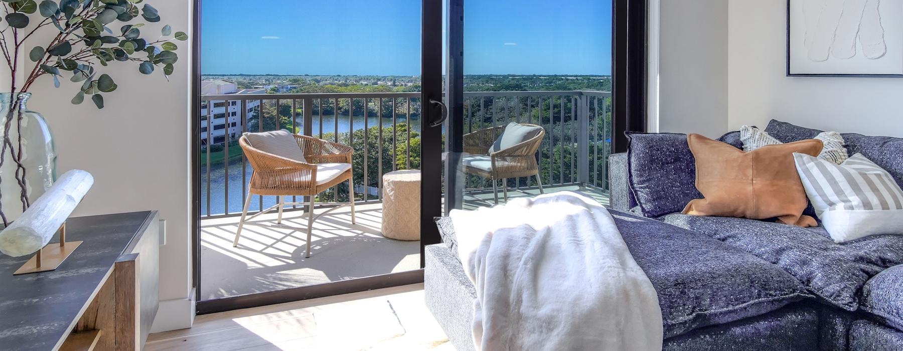 living room with access to private balcony