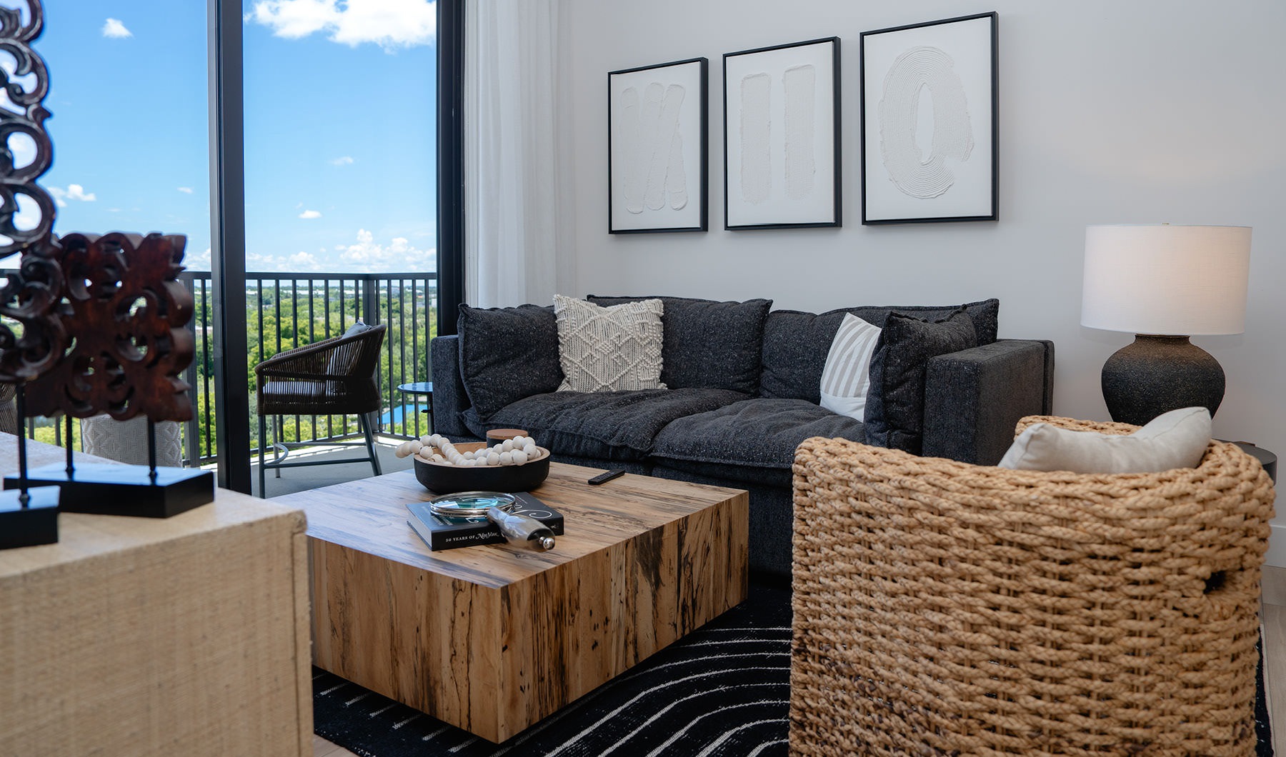 bright living room with private balcony access